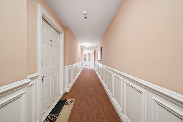 45 Broadway Unit 204, Jersey City, NJ 07306 - hall with a decorative wall and a wainscoted wall