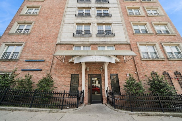 45 Broadway Unit 204, Jersey City, NJ 07306 - view of apartment building / complex with a fenced front yard