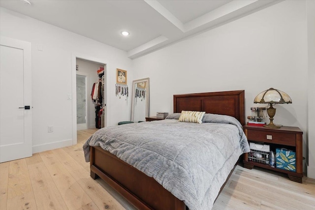 226 Bay St Unit 1, Jersey City, NJ 07302 - bedroom featuring light wood finished floors, a spacious closet, recessed lighting, a closet, and baseboards