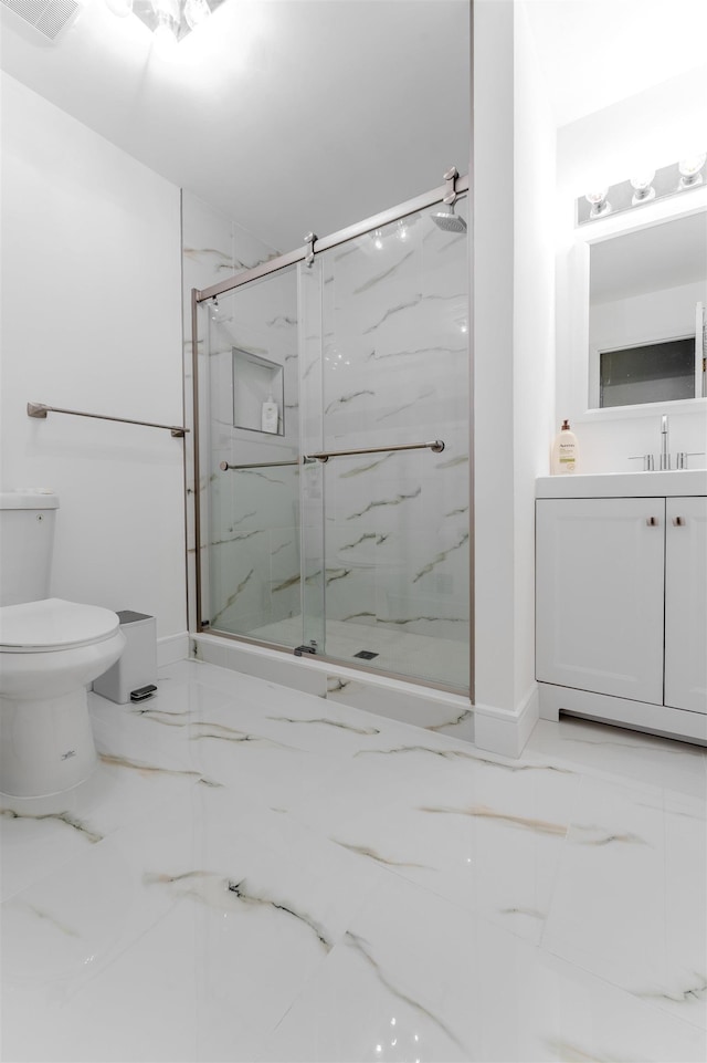 12 Davey Dr, West Orange, NJ 07052 - bathroom featuring marble tiled flooring, a marble finish shower, and vanity
