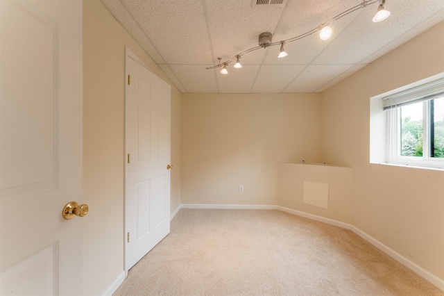 12 Davey Dr, West Orange, NJ 07052 - empty room with light colored carpet and a drop ceiling