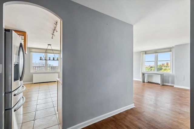 380 Mountain Rd Unit 213, Union City, NJ 07087 - hall with rail lighting and arched walkways