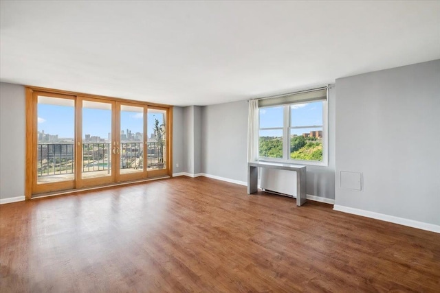 380 Mountain Rd Unit 213, Union City, NJ 07087 - unfurnished room with wood finished floors and a city view