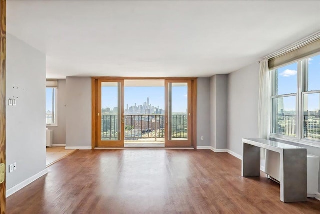 380 Mountain Rd Unit 213, Union City, NJ 07087 - unfurnished room with wood finished floors and a view of skyline