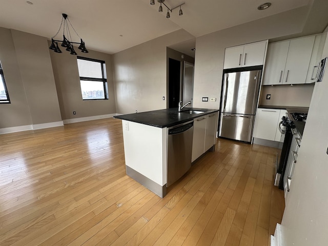 4 Beacon Way Unit 1001, Jersey City, NJ 07304 - kitchen featuring stainless steel appliances, dark countertops, a sink, and white cabinets
