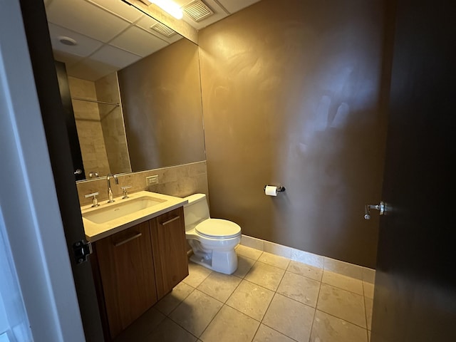 4 Beacon Way Unit 1001, Jersey City, NJ 07304 - bathroom featuring toilet, tile patterned floors, tile walls, vanity, and a shower