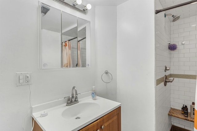 bathroom featuring a shower with curtain and vanity