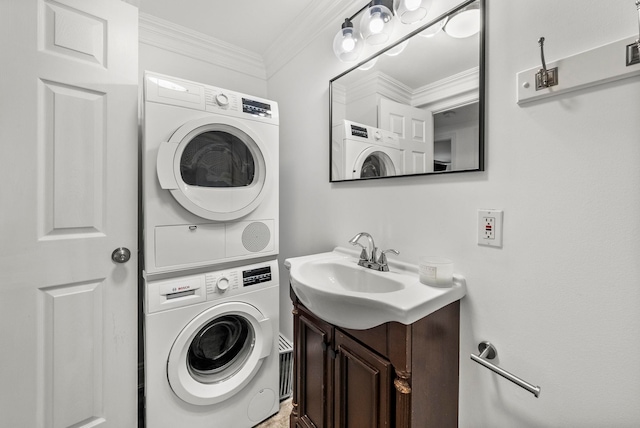 607 1st St Unit 1, Hoboken, NJ 07030 - laundry room featuring stacked washer / dryer and ornamental molding