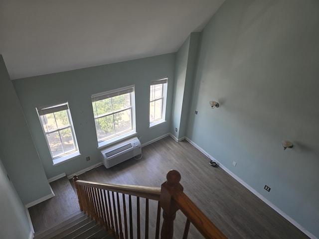 54 Polk St, Newark, NJ 07105 - staircase with wood finished floors and a wall mounted air conditioner