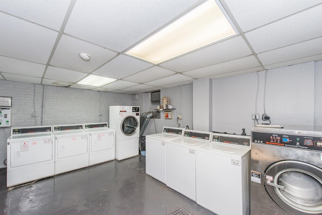 washroom with washer and dryer