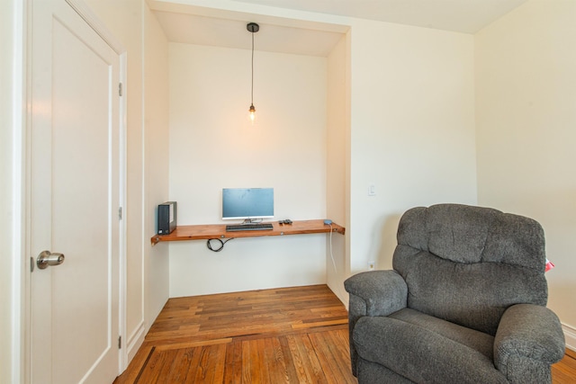 living area with wood-type flooring