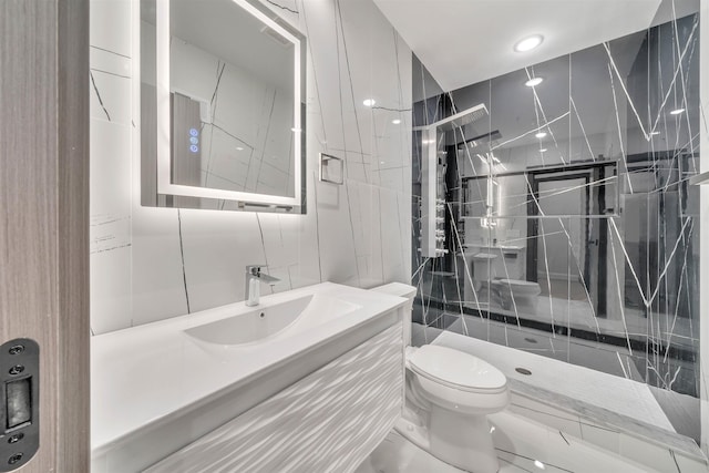 bathroom featuring tile walls, toilet, vanity, and walk in shower