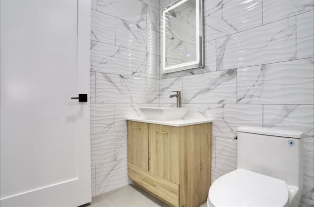 443 Bergen Ave Unit 3, Jersey City, NJ 07304 - bathroom featuring tile walls and vanity