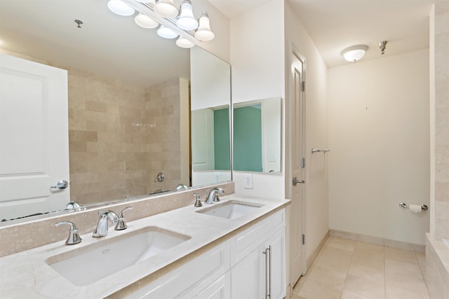 15 Enterprise Ct Unit 211, Jersey City, NJ 07305 - bathroom featuring double vanity, a sink, tile patterned floors, and baseboards