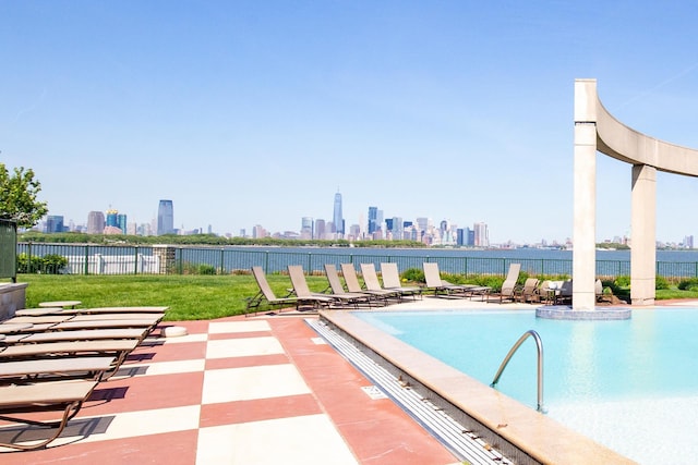 15 Enterprise Ct Unit 211, Jersey City, NJ 07305 - pool featuring a view of city, a patio, a yard, and fence