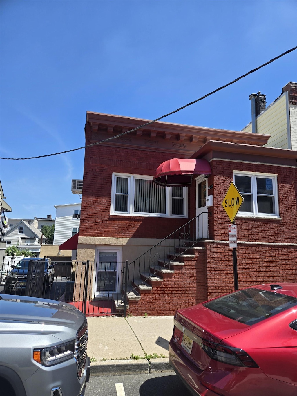 6206 Meadowview Ave, North Bergen, NJ 07047 - view of front facade featuring brick siding