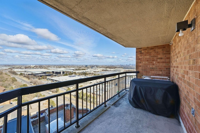 balcony featuring area for grilling