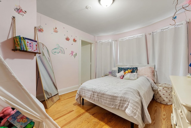 26 E 49th St, Bayonne, NJ 07002 - bedroom featuring light wood-type flooring and baseboards