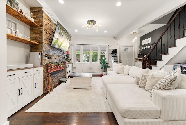 26 E 49th St, Bayonne, NJ 07002 - living room featuring stairs, a fireplace, dark wood-style floors, recessed lighting, and a chandelier
