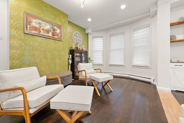 26 E 49th St, Bayonne, NJ 07002 - sitting room with wallpapered walls, wood finished floors, recessed lighting, baseboard heating, and baseboards