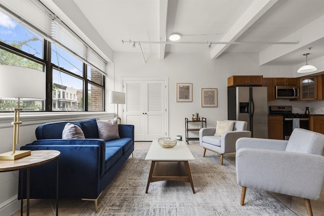 300 Communipaw Ave Unit 17, Jersey City, NJ 07304 - living room with beam ceiling and track lighting