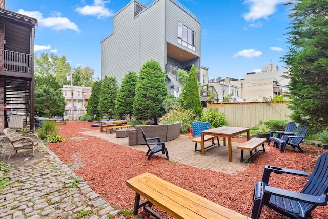 300 Communipaw Ave Unit 17, Jersey City, NJ 07304 - view of patio with an outdoor hangout area and fence