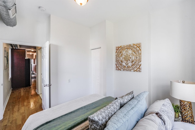 bedroom featuring a closet and hardwood / wood-style floors