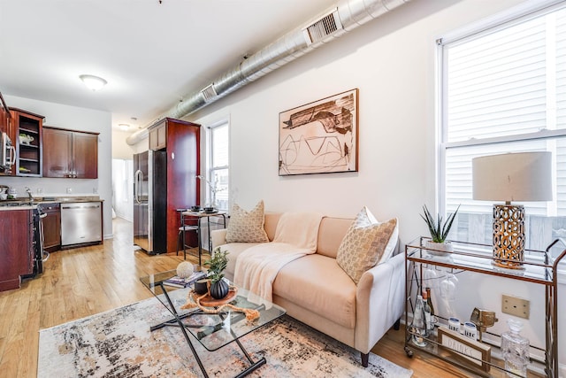 living room featuring light hardwood / wood-style floors