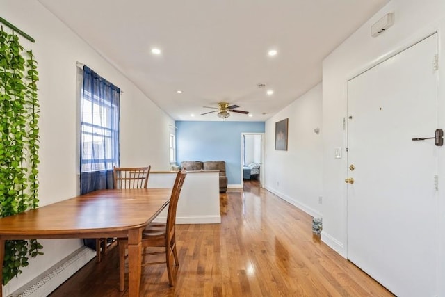 527 Kennedy Blvd, Bayonne, NJ 07002 - dining area featuring light wood finished floors, ceiling fan, baseboards, and recessed lighting