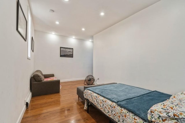 527 Kennedy Blvd, Bayonne, NJ 07002 - bedroom with baseboards, recessed lighting, and wood finished floors