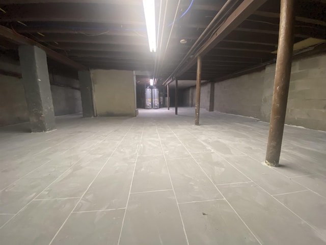 527 Kennedy Blvd, Bayonne, NJ 07002 - unfinished below grade area with gas water heater