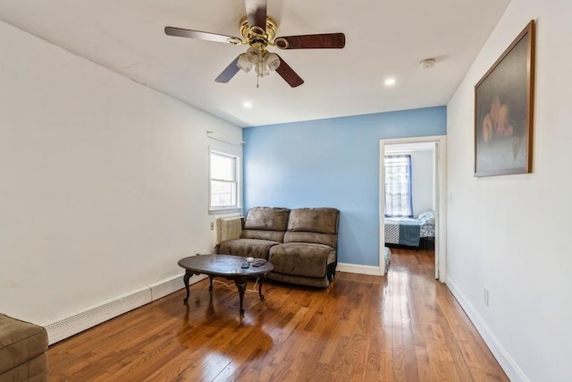 527 Kennedy Blvd, Bayonne, NJ 07002 - sitting room featuring a ceiling fan, recessed lighting, a baseboard radiator, wood-type flooring, and baseboards