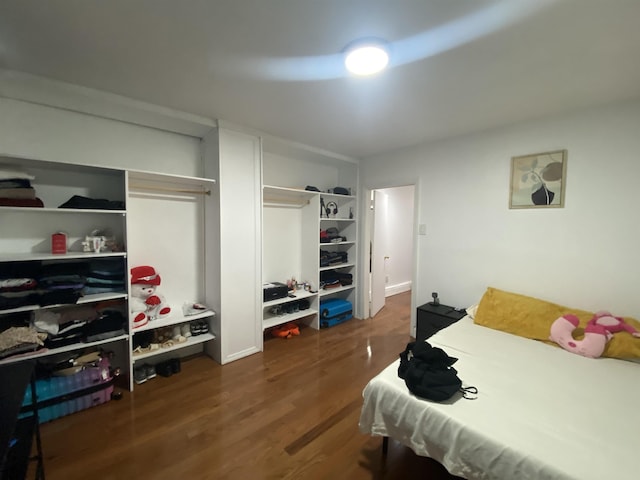 527 Kennedy Blvd, Bayonne, NJ 07002 - bedroom with dark wood-style floors
