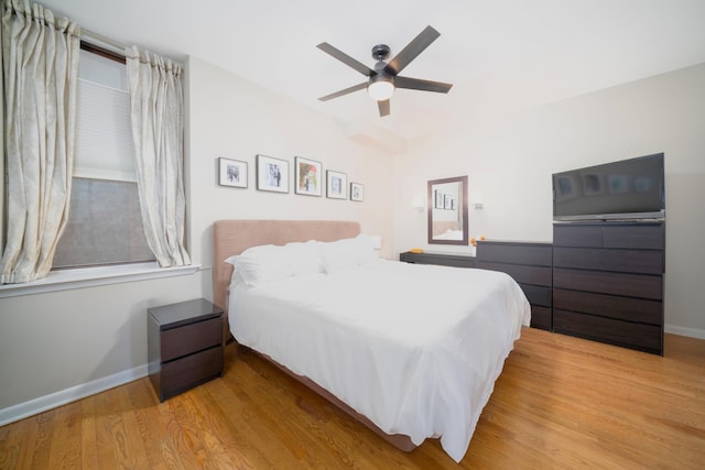 186 Wayne St Unit D-106, Jersey City, NJ 07302 - bedroom featuring baseboards, wood finished floors, and a ceiling fan