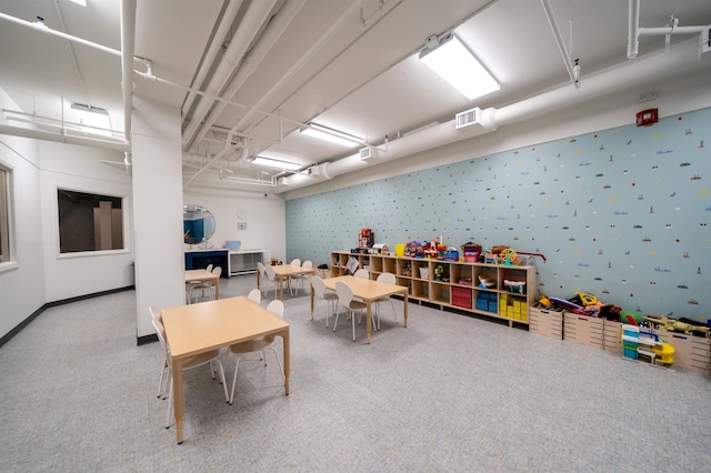 186 Wayne St Unit D-106, Jersey City, NJ 07302 - playroom with carpet floors and wallpapered walls