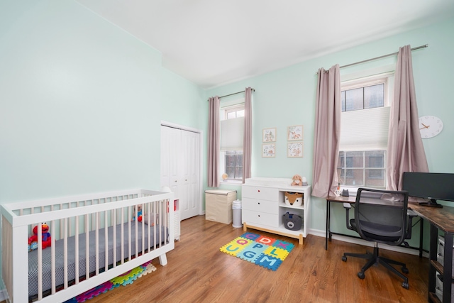 186 Wayne St Unit D-106, Jersey City, NJ 07302 - bedroom with a closet, wood finished floors, and a desk