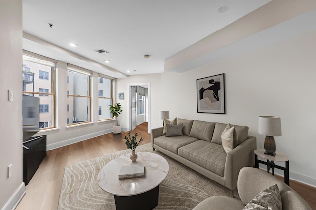 1100 Clinton St Unit 305, Hoboken, NJ 07030 - living area featuring wood finished floors and recessed lighting