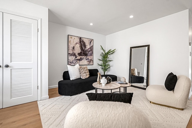 127 Jane St, Weehawken, NJ 07086 - living area featuring light wood-style floors and recessed lighting