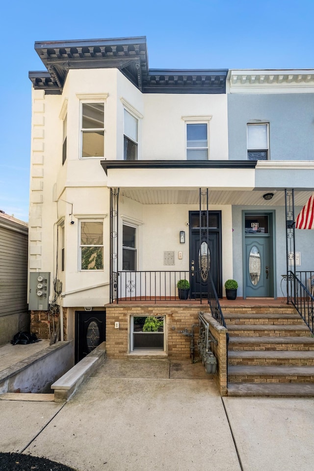 127 Jane St, Weehawken, NJ 07086 - multi unit property featuring stucco siding and a porch