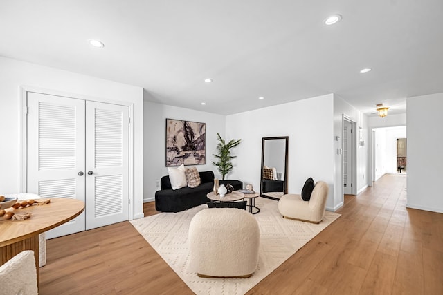127 Jane St, Weehawken, NJ 07086 - living area featuring light wood-type flooring and recessed lighting