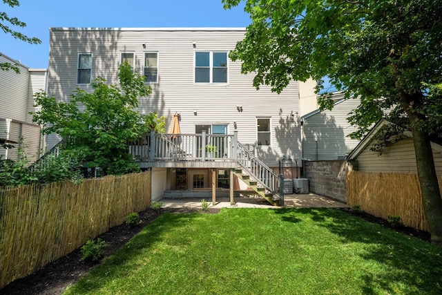 127 Jane St, Weehawken, NJ 07086 - back of house with stairs, a deck, a patio area, and central AC