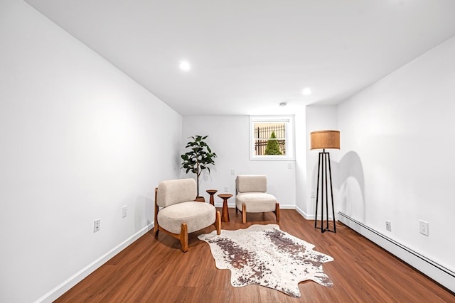 127 Jane St, Weehawken, NJ 07086 - sitting room with baseboard heating, wood finished floors, baseboards, and recessed lighting