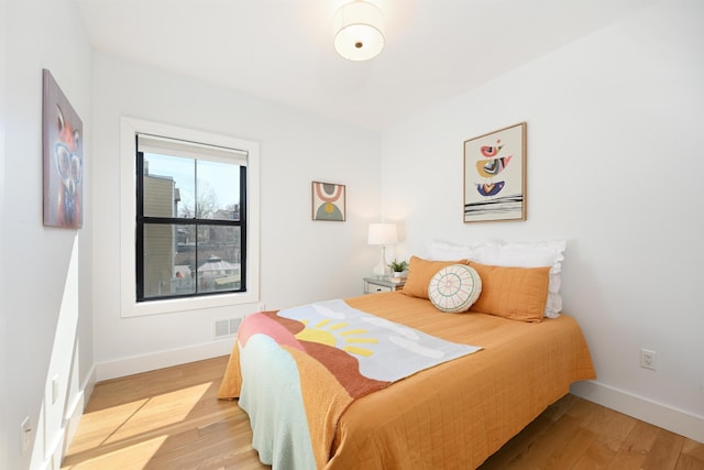 77 Clerk St Unit 1, Jersey City, NJ 07305 - bedroom featuring baseboards and light wood-type flooring