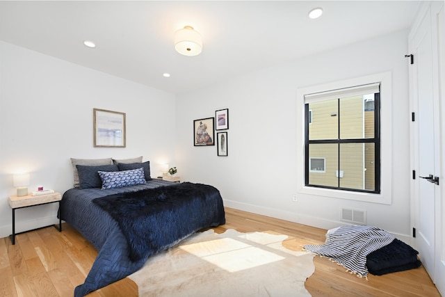 77 Clerk St Unit 1, Jersey City, NJ 07305 - bedroom featuring light wood finished floors, baseboards, and recessed lighting