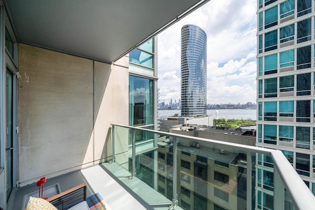1 Shore Ln Unit 1208, Jersey City, NJ 07310 - balcony featuring a view of city and a water view