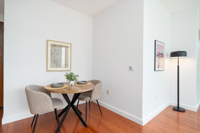 1 Shore Ln Unit 1208, Jersey City, NJ 07310 - dining area featuring light wood-style floors
