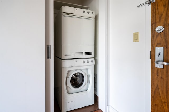 1 Shore Ln Unit 1208, Jersey City, NJ 07310 - washroom featuring stacked washer / drying machine