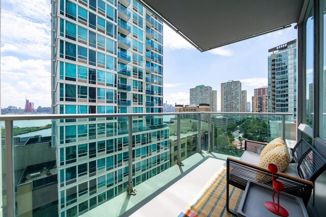 1 Shore Ln Unit 1208, Jersey City, NJ 07310 - balcony featuring a city view
