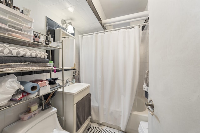 7505 Palisade Ave Unit E1, North Bergen, NJ 07047 - bathroom featuring toilet, shower / bath combo with shower curtain, and vanity