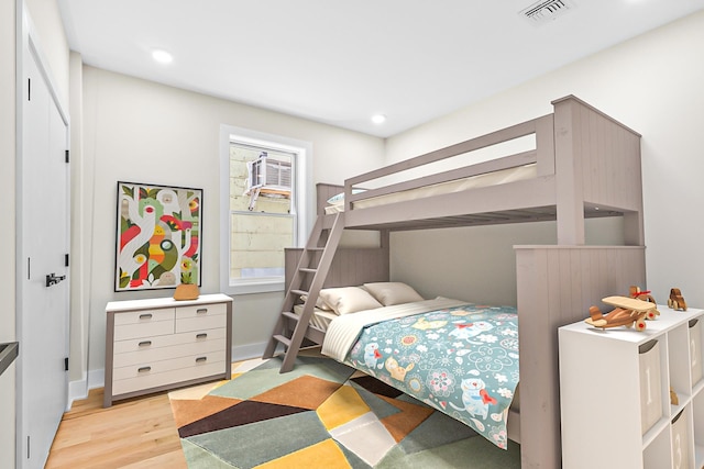 bedroom featuring light wood-type flooring